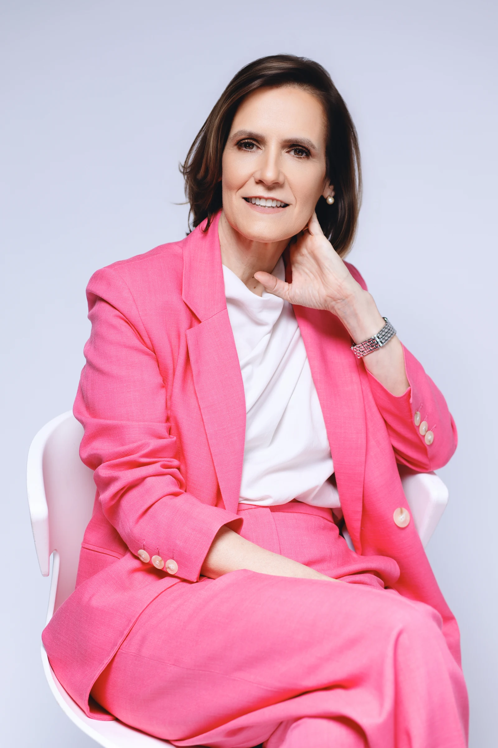 Portrait of Gabriela Pulido in a pink suit